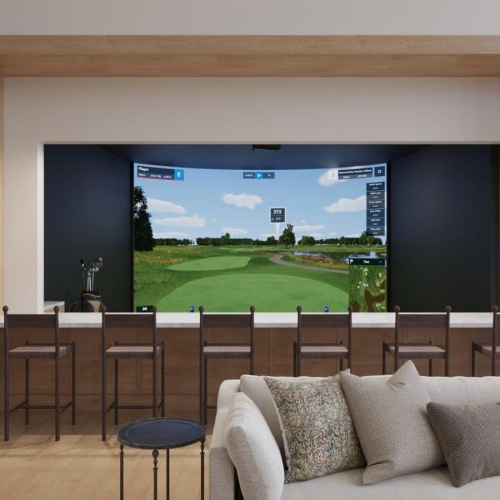 a clubroom with a tv and chairs