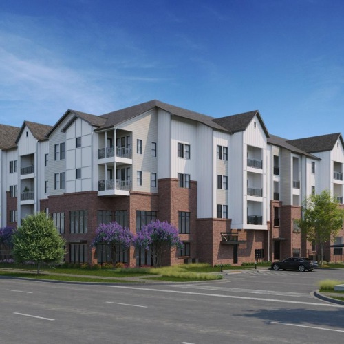 a large building with trees in front of it